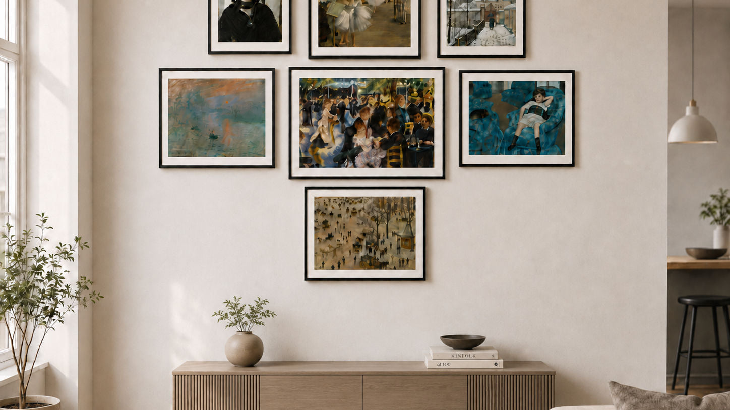 Impressionist gallery wall art featuring framed works by Monet, Renoir, Degas and Cassatt above a modern wooden console table.
