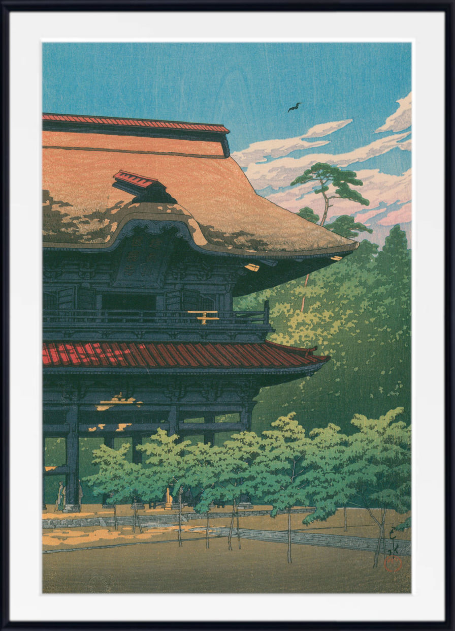 A framed art print featuring a Japanese-style illustration of a traditional wooden temple with a large thatched roof, surrounded by green trees under a blue sky with white clouds.
