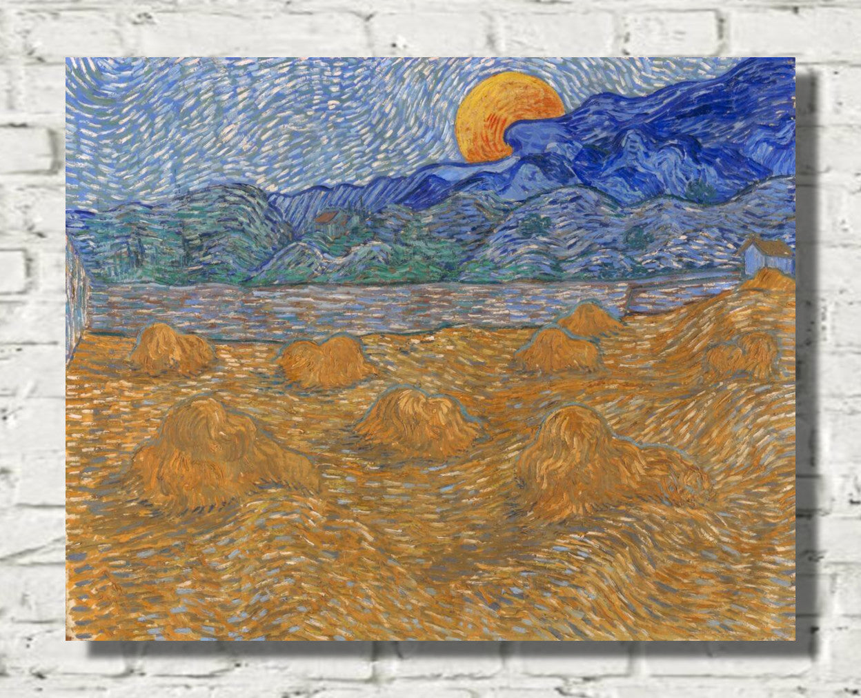 Landscape with Wheat Sheaves and Rising Moon (1889) by Vincent van Gogh