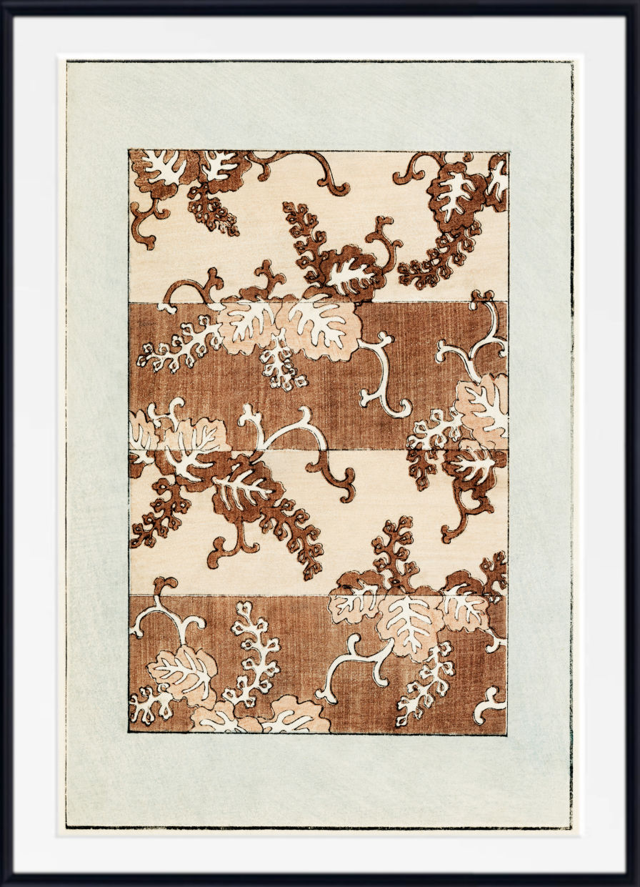 A framed art print featuring a botanical pattern with brown and beige leaves on a cream background, surrounded by a wide white mat and a black frame.
