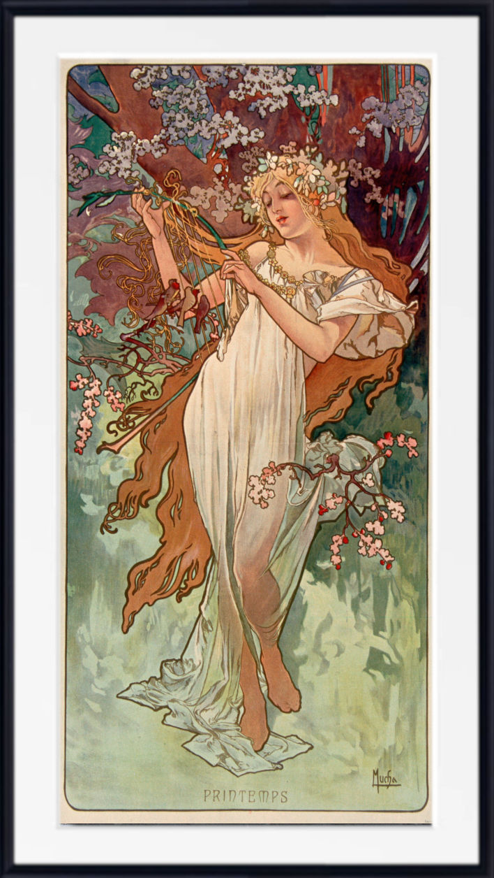 A framed Art Nouveau style print featuring a woman in a flowing white dress among flowering branches and foliage, with a black frame and white mat around the artwork.