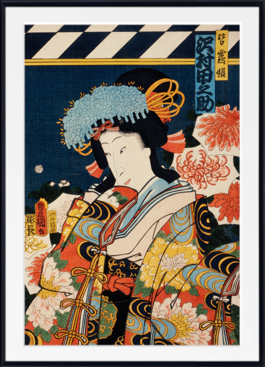 A framed Japanese ukiyo-e woodblock print featuring a woman in an ornate floral robe against a dark blue background with large chrysanthemum flowers and vertical Japanese text.
