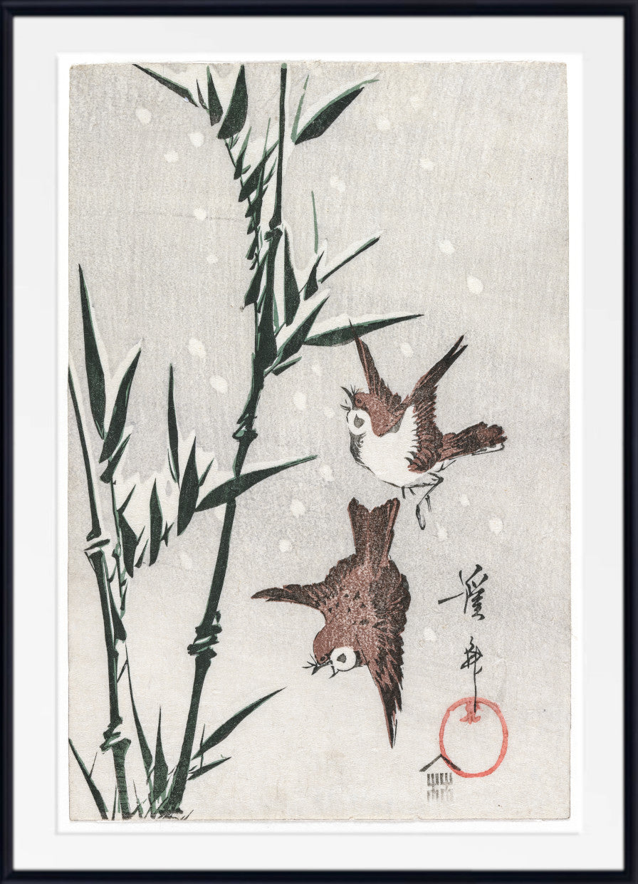 A framed Japanese-style art print featuring two small brown birds near bamboo on a light textured background, with black calligraphy and a red seal in the lower right. The print is shown with a white mat and black frame.