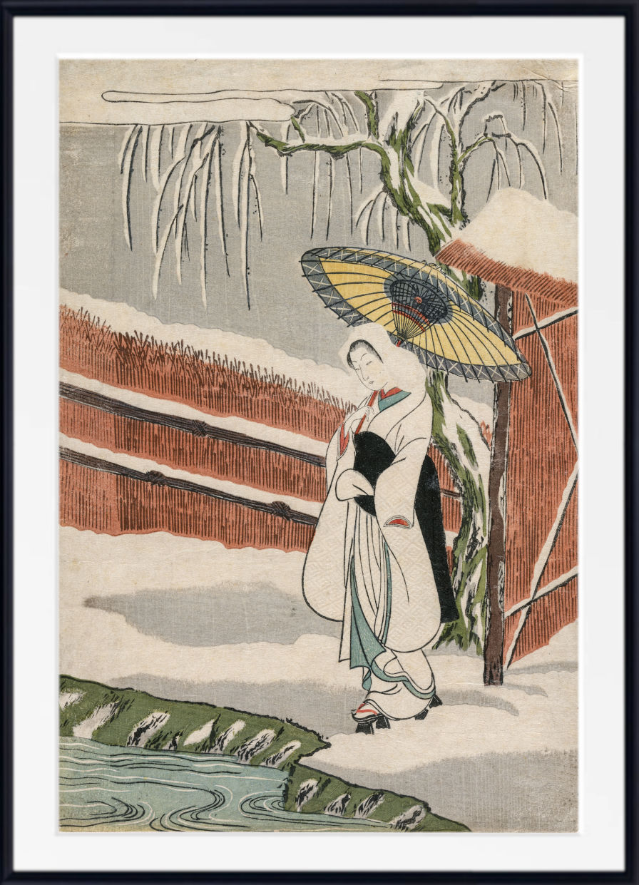 A framed Japanese-style art print depicting a woman in a white kimono holding a yellow parasol in a snowy outdoor scene with a tree and fence.