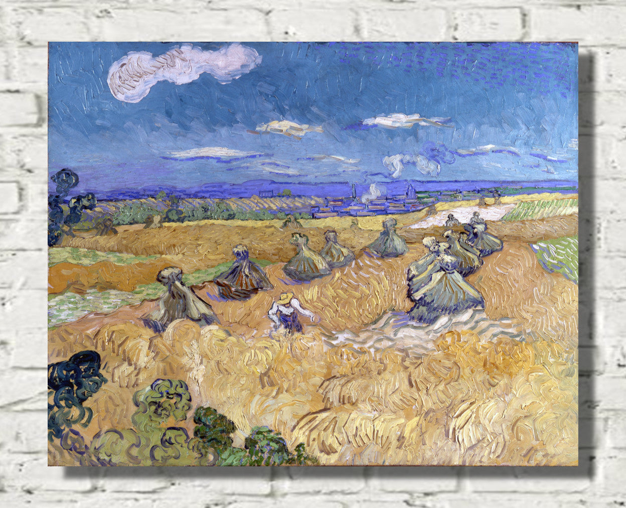 Wheat Stacks with Reaper (1888) by Vincent van Gogh