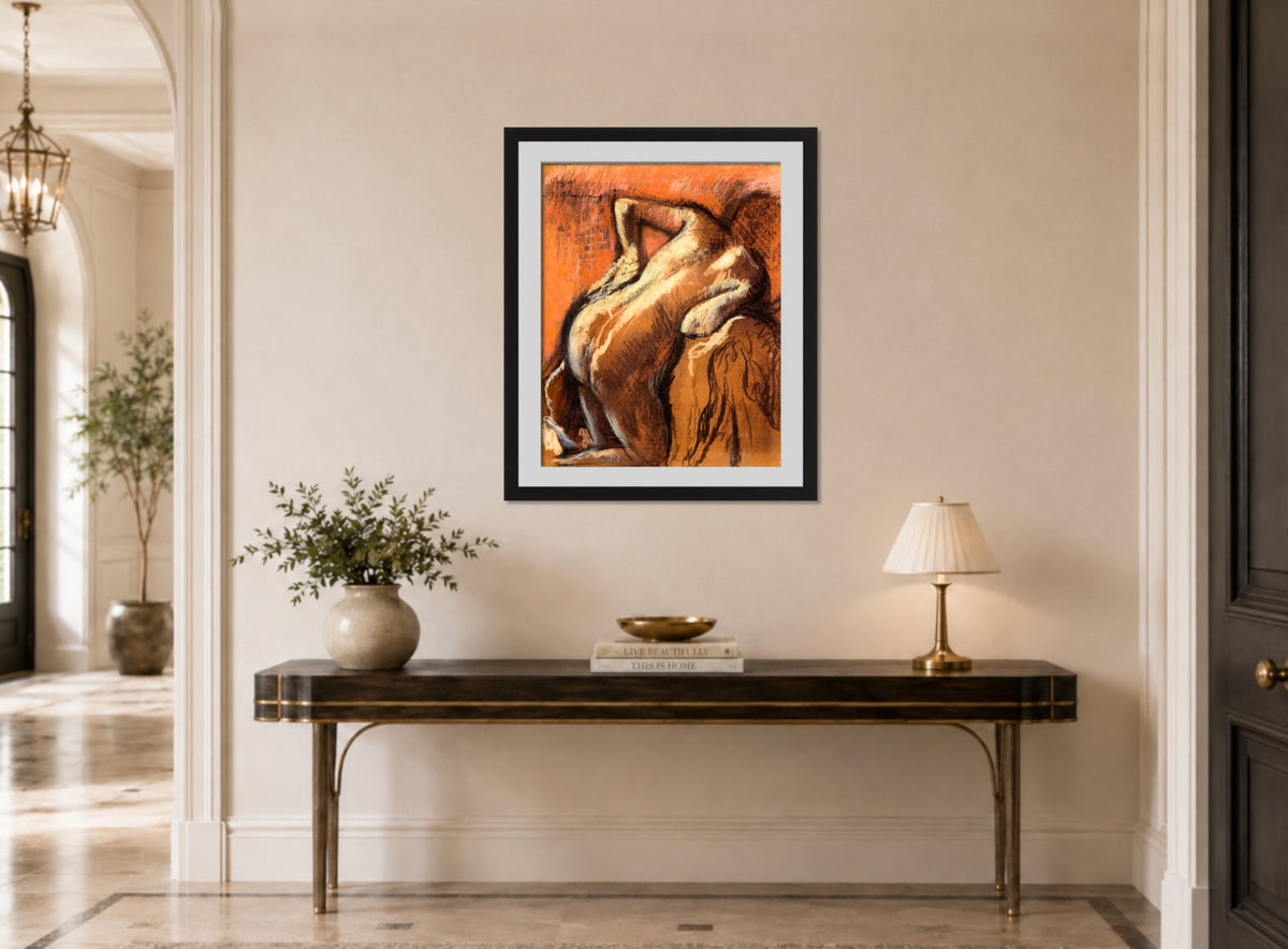 Edgar Degas Print, Après le bain, femme s’essuyant (1892) displayed above a console table