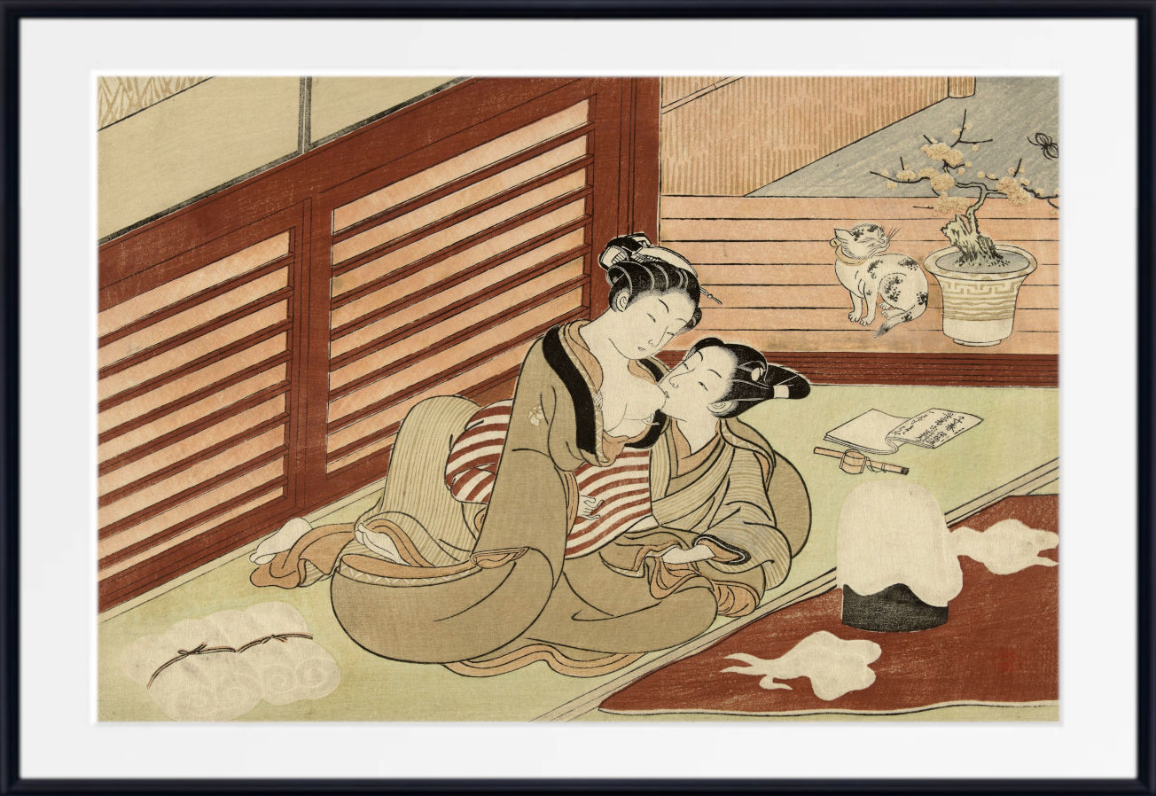 A framed Japanese-style art print depicting two women in traditional robes seated indoors, with a sliding door, potted plant, and small cat in the background.