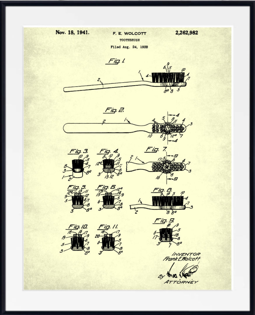 A framed vintage patent print for a toothbrush, dated November 18, 1941, showing multiple black technical drawings and labels on an aged cream background, presented in a white frame.