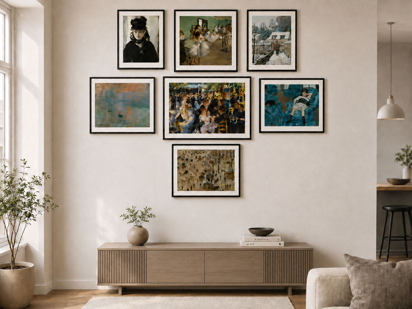 Impressionist gallery wall art featuring framed works by Monet, Renoir, Degas and Cassatt above a modern wooden console table.
