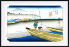A framed Japanese ukiyo-e woodblock print depicting a figure in a boat on blue water, with other boats, distant shoreline, and Japanese text on the right side.