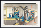 A framed Japanese ukiyo-e woodblock print depicting figures in a traditional interior scene with sliding doors, blue garments, palm-like foliage, and a textured paper background, shown with a white mat and black frame.