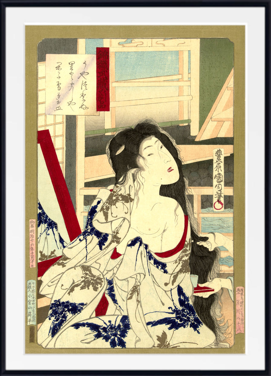 A framed Japanese ukiyo-e woodblock print featuring a woman in a white robe with blue floral patterns and red accents, shown against a beige background with a black frame.