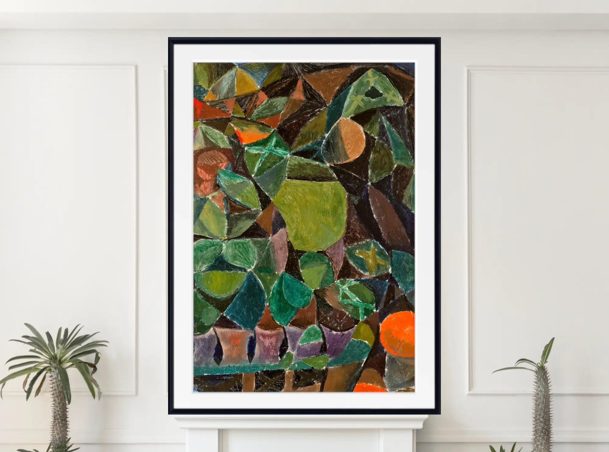 A framed abstract art print featuring a colorful geometric pattern in shades of green, brown, orange, and purple, displayed on a white wall above a white mantel with small potted plants on either side.  Paul Klee Fine Art Print, Blumensteg (1913)