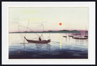 A framed art print depicting a serene Japanese-style harbor scene at sunset, with several boats on calm water, a small orange sun, and distant mountains. The print is matted with a white border and enclosed in a black frame.