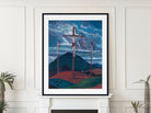 A framed art print depicting a dramatic scene of three crosses under a stormy blue sky, displayed on a white wall above a fireplace mantel.