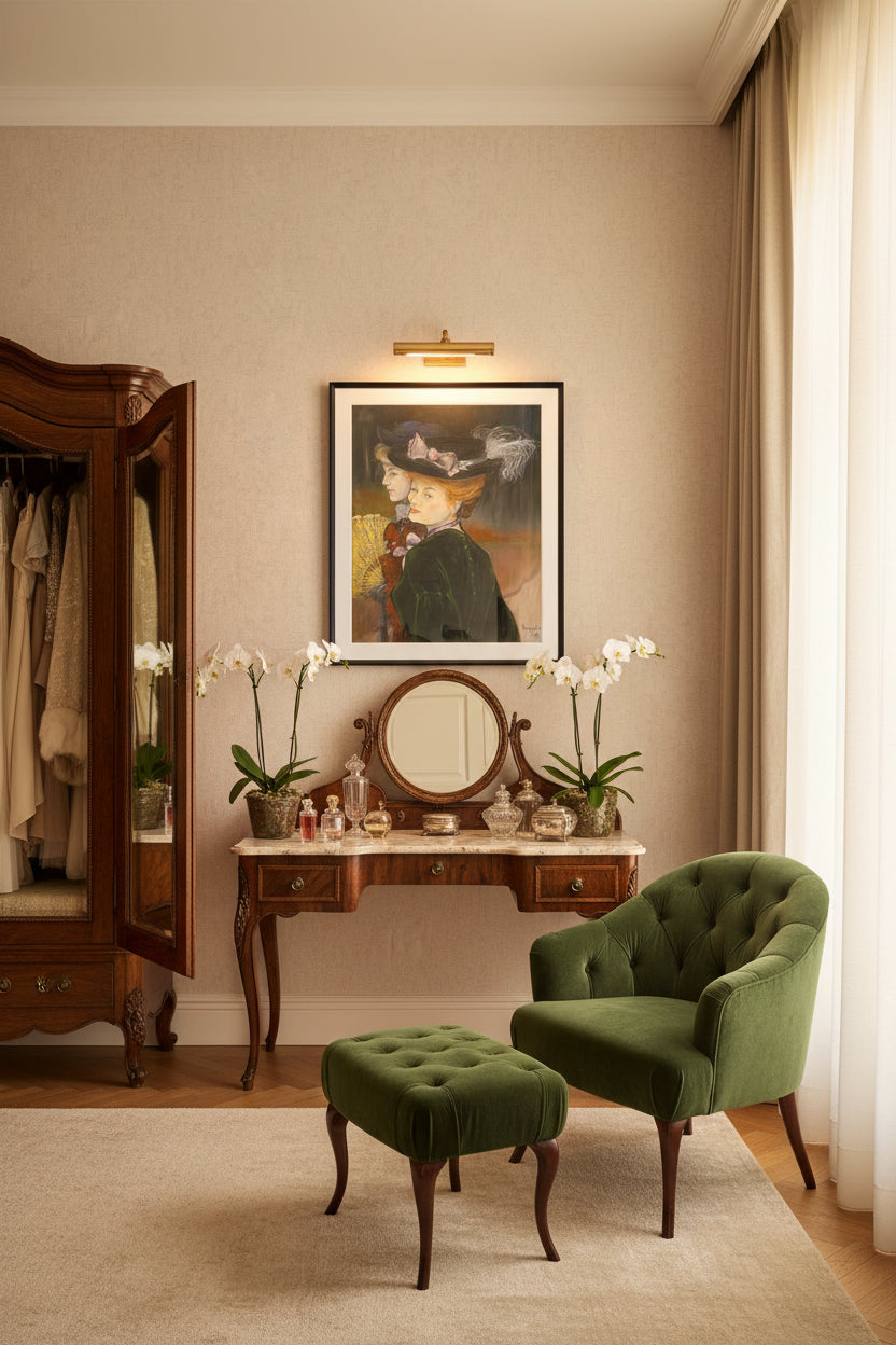 A framed art print featuring a pastel-style portrait painting of two women in profile. The woman in the foreground wears a large black hat with feathers and a dark green coat, while the other woman holds a yellow fan.
