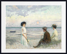 A framed art print depicting an impressionist beach scene with three figures near the water under a cloudy sky with a sun near the horizon.