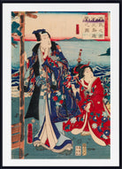 A framed Japanese ukiyo-e woodblock print showing two figures in ornate traditional robes by the sea, with a black frame and white mat around the artwork.