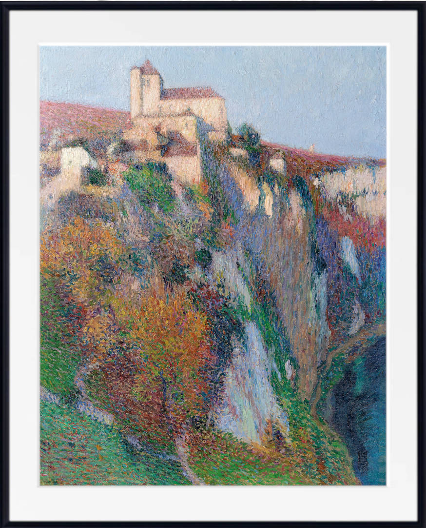 The Saint-Cirq Lapopie church perched on the cliff of the Lot loop, blue sky