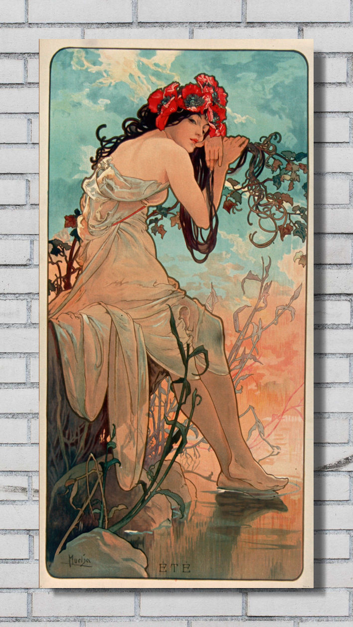 A vintage Art Nouveau style poster print featuring a seated woman with dark hair and a red floral headpiece, mounted against a white brick wall.