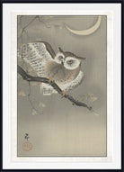 A framed Japanese-style art print depicting a detailed owl perched on a branch under a crescent moon, with a white mat and black frame.