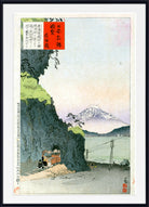 A framed Japanese ukiyo-e woodblock print depicting Mount Fuji in the distance, with a dark rocky cliff in the foreground, a small train at the bottom left, and red and black text boxes in the upper left.