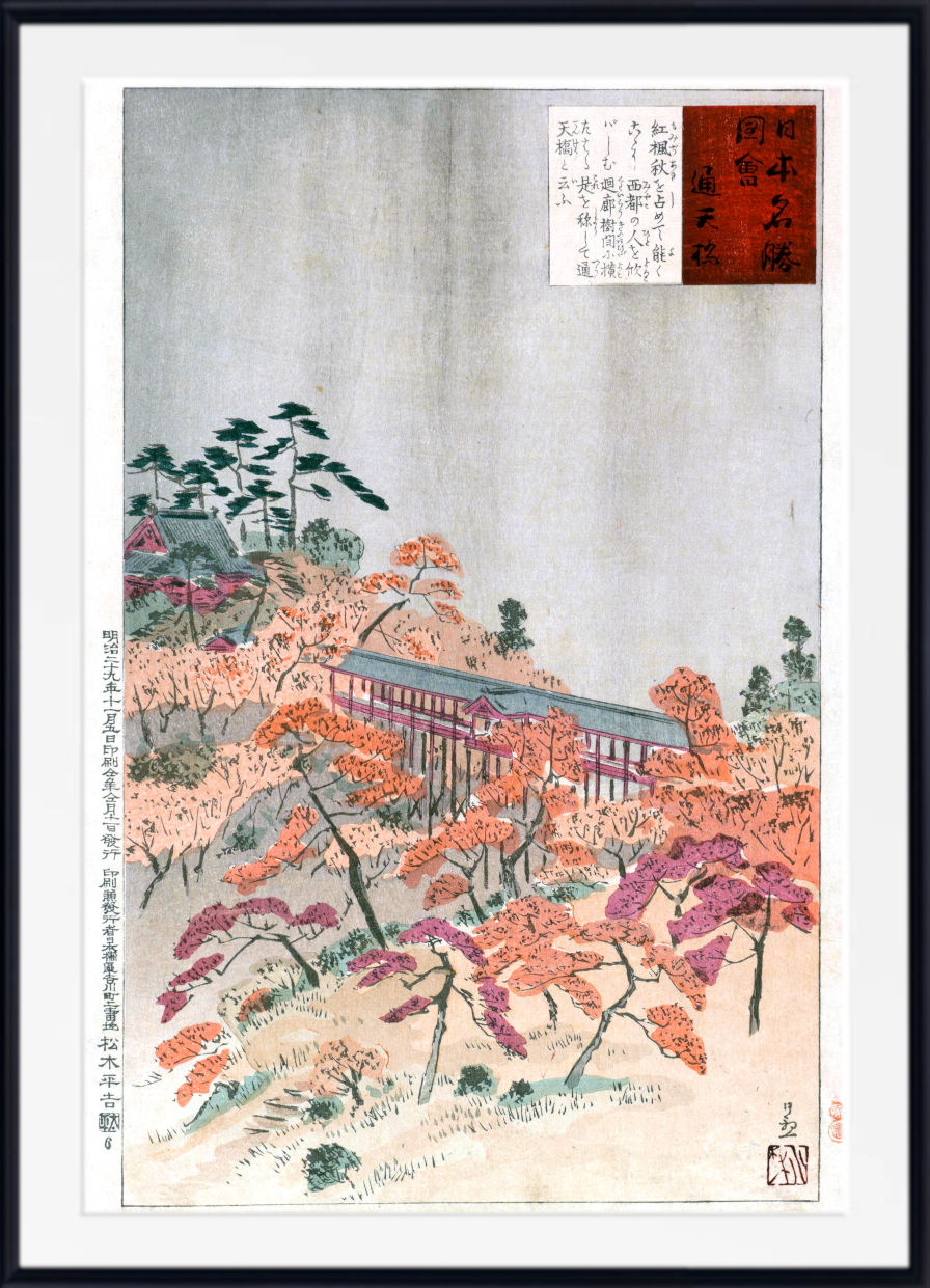 A framed Japanese-style art print depicting an autumn landscape with orange and purple foliage, a long bridge, and a pale sky, shown with a white mat and black frame.