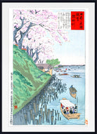A framed Japanese ukiyo-e woodblock print depicting a scenic river or harbor with pink cherry blossoms, a green hillside, wooden boats, and Japanese text panels, shown against a white background with a black frame.
