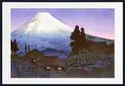 A framed Japanese-style art print depicting Mount Fuji with a snow-capped peak under a purple and pink sky, with small traditional houses and dark trees in the foreground.