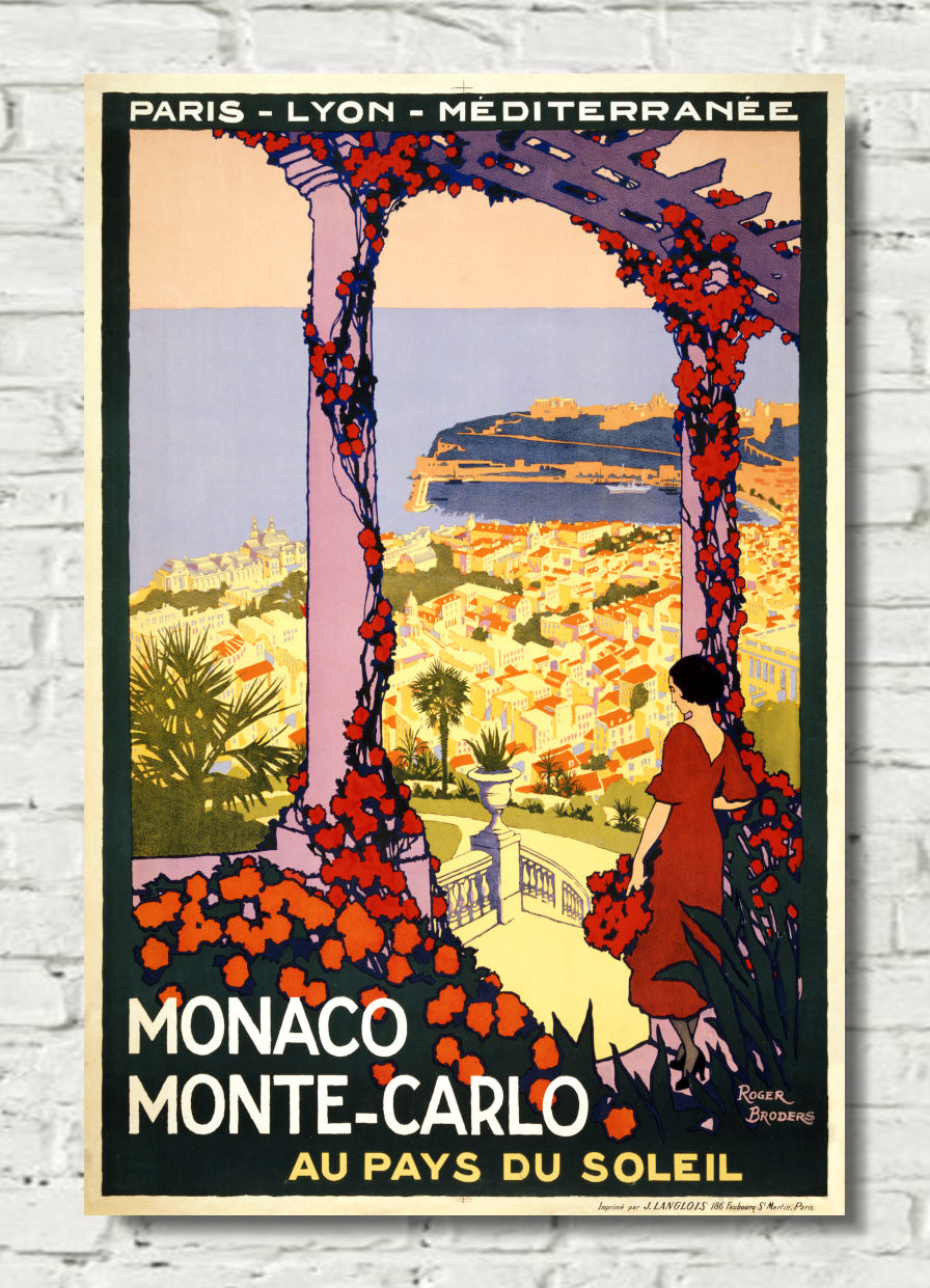 Vintage-style travel poster for Monaco and Monte-Carlo, featuring an illustrated woman in a red dress standing beneath a floral archway with a coastal cityscape in the background. The poster is displayed against a white brick wall.
