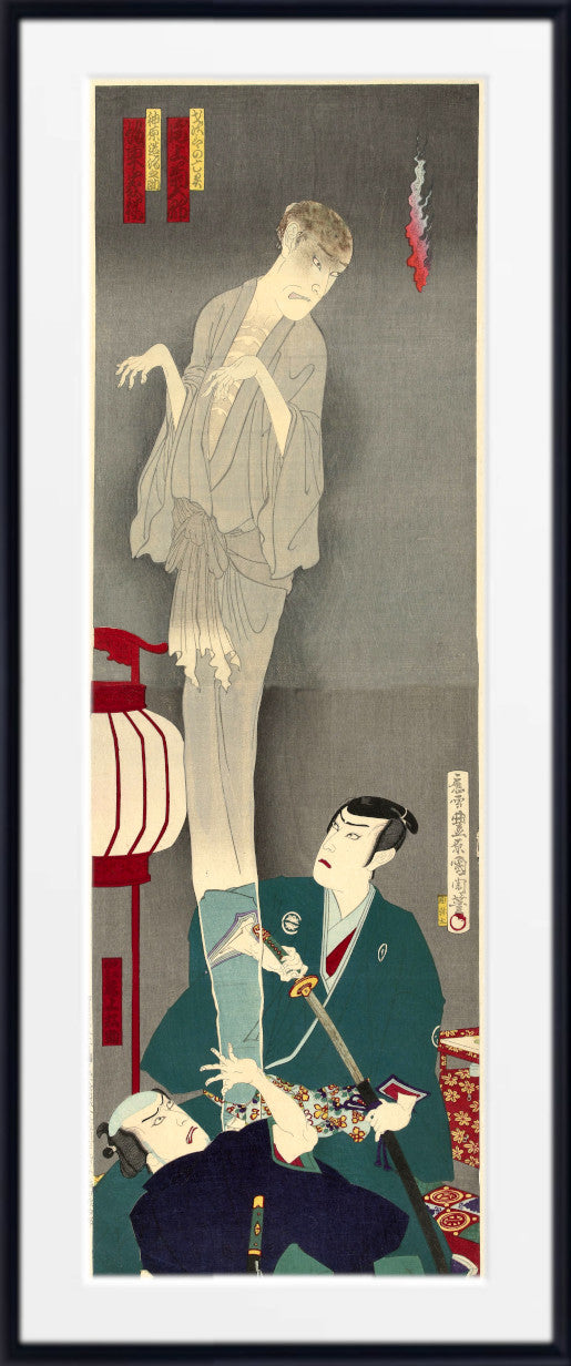 A framed Japanese ukiyo-e woodblock print featuring a tall, pale figure in a light robe standing over two seated men in dark garments, with red lantern and hanging flags in the background.