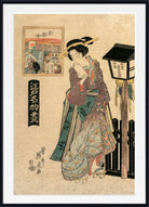 A framed Japanese ukiyo-e woodblock print featuring a woman in a patterned kimono standing beside a lantern, with a smaller inset scene and vertical text on an aged beige paper background.