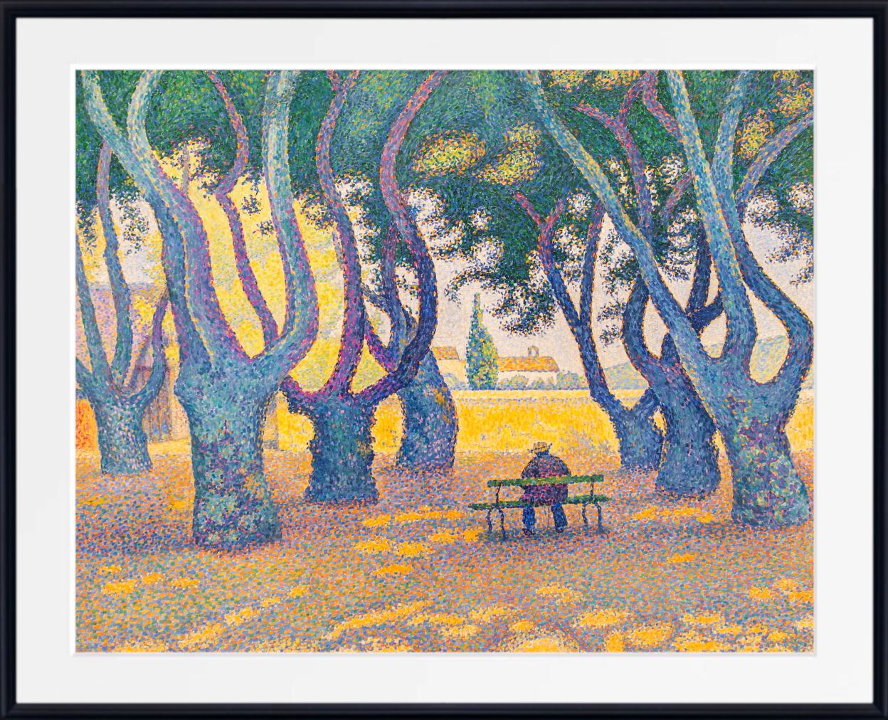 A framed art print featuring a pointillist painting of a park scene with gnarled trees, a bench, and a seated figure, shown with a white mat and black frame.