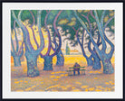 A framed art print featuring a pointillist painting of a park scene with gnarled trees, a bench, and a seated figure, shown with a white mat and black frame.