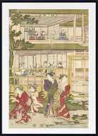 A framed Japanese ukiyo-e woodblock print depicting women in traditional red and blue kimonos walking and standing in a garden courtyard, with a white mat and black frame.