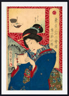 A framed Japanese ukiyo-e woodblock print featuring a woman in a blue kimono holding a cup, with red patterned borders, black hair, and vertical calligraphic text panels.