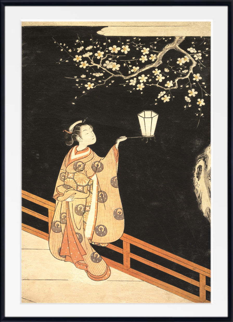 A framed Japanese-style art print depicting a woman in a patterned kimono holding a lantern under flowering branches against a dark background.
