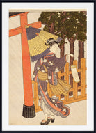 A framed Japanese-style art print depicting a woman in a dark kimono holding a large folding fan beside a red torii gate and wooden fence, with trees in the background.