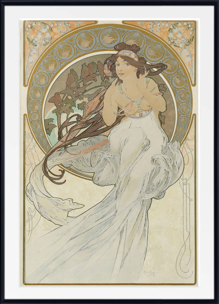 A framed Art Nouveau style art print featuring a woman in a flowing white gown with long dark hair, surrounded by ornate gold and beige decorative borders on a cream background.
