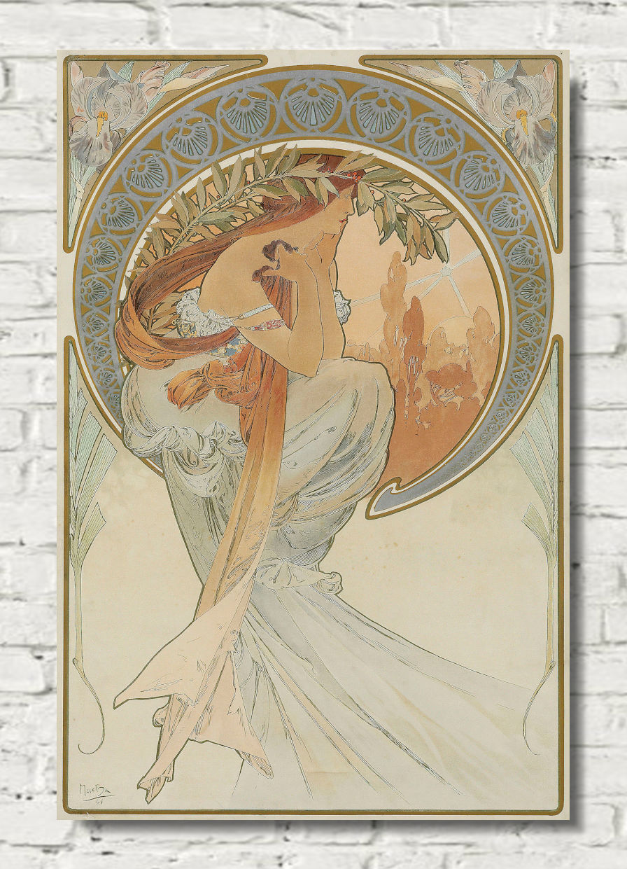 An Art Nouveau style poster print featuring a woman in flowing white drapery with a long orange-brown hair or scarf, framed by ornate gold and blue decorative borders. The print is displayed against a white brick wall background.