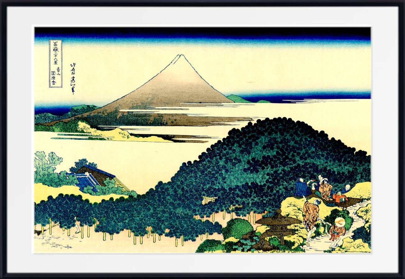 A framed Japanese-style art print depicting Mount Fuji with dark green trees, blue water, and small figures in the foreground, shown against a white mat and black frame.