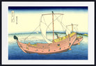 A framed Japanese-style art print showing two wooden sailing ships on blue water under a pale sky, with a white mat and black frame around the artwork.