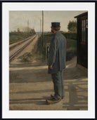 A framed art print of a classic oil painting depicting a train station scene with a guard in uniform standing by the tracks, shown with a white mat and black frame.