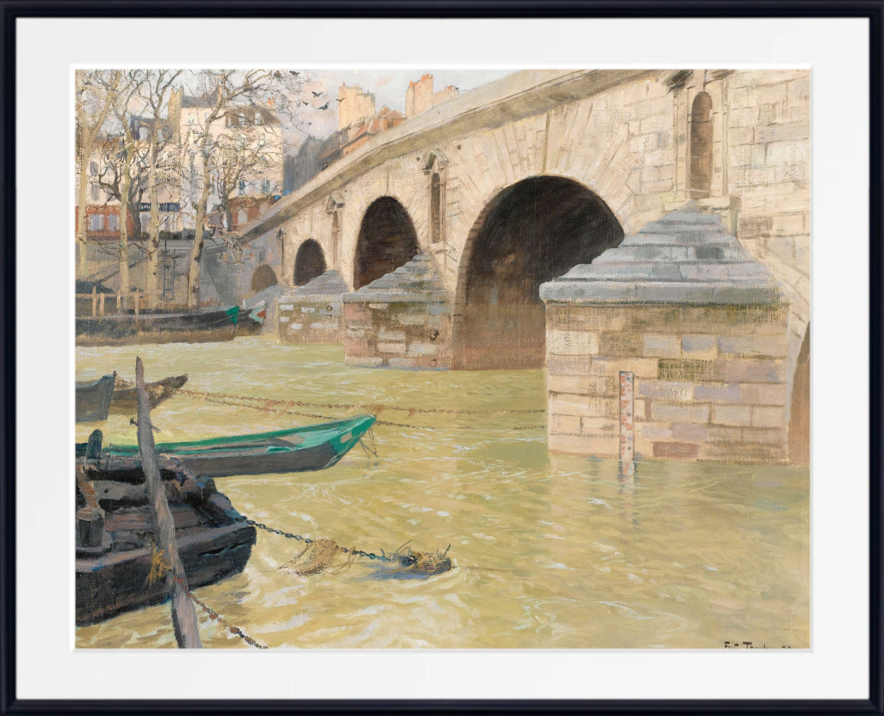 A framed watercolor painting of a stone bridge over a river with boats, shown with a wide white mat and black frame.