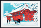 A framed art print depicting a traditional Japanese red temple in a snowy landscape under a light blue sky, with a black rickshaw and two walking figures in the foreground.