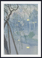 A framed Japanese-style art print depicting a serene twilight scene with weeping willow branches in the foreground, a torii gate, and soft blue-gray mist over water and trees. The print is shown with a white mat and a black frame.