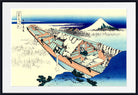 A framed Japanese-style art print depicting a snow-covered boat on a shoreline with Mount Fuji in the background, shown against a white mat and black frame.