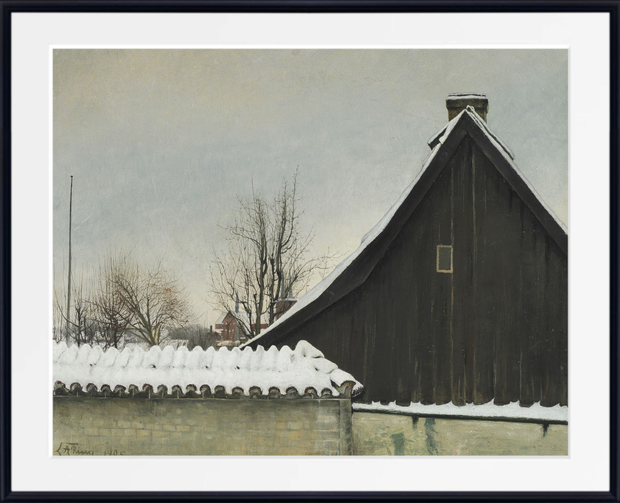 A framed art print depicting a winter landscape with a dark wooden barn, snow-covered roofs, bare trees, and a pale gray sky, shown with a wide white mat and black frame.