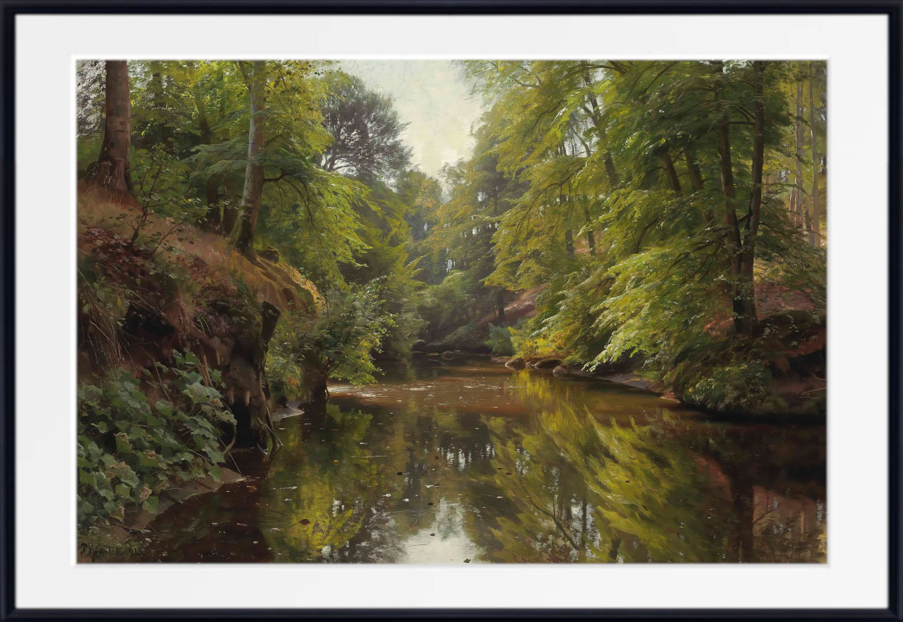 A framed landscape art print depicting a serene forest river with lush green trees and reflective water, presented in a black frame with a white mat.