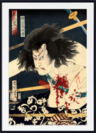 A framed Japanese ukiyo-e woodblock print featuring a dramatic, blood-splattered warrior with dark hair against a dark blue background, shown with a white mat and black frame.